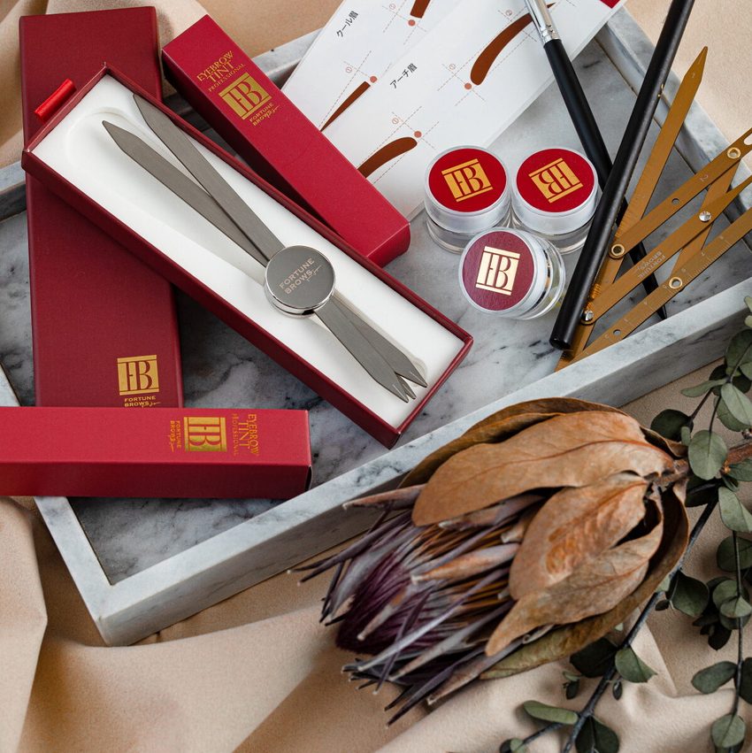 The Fortunebrows original kit, frames, calipers, thread, tint and brushes in a red case